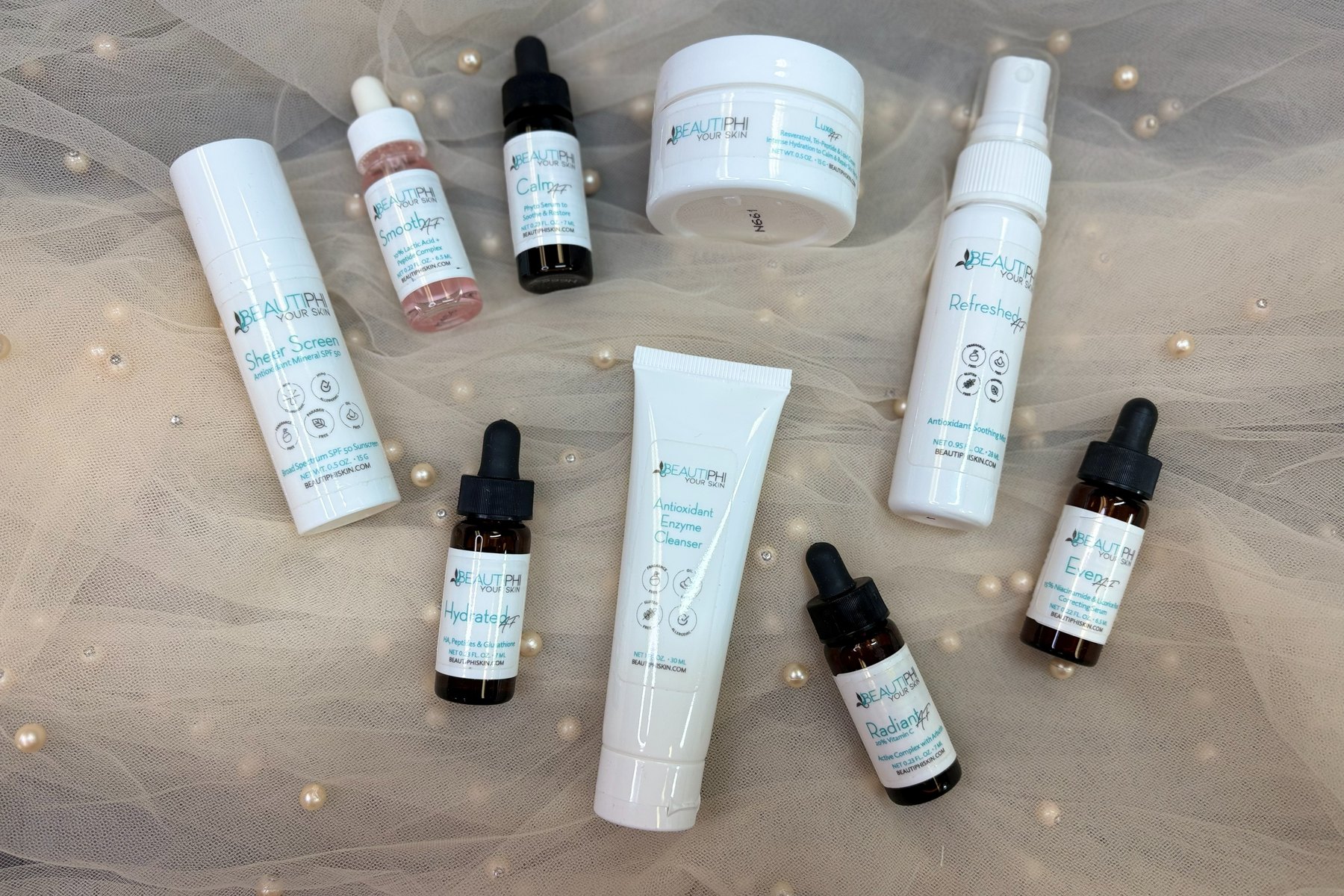 The nine-piece Beautiphi travel set that comes with joining: Sheer Screen SPF 50, Smooth AF, Calm AF, Luxe AF, Refreshed AF, Hydrated AF, Antioxidant Enzyme Cleanser, Radiant AF and Even AF