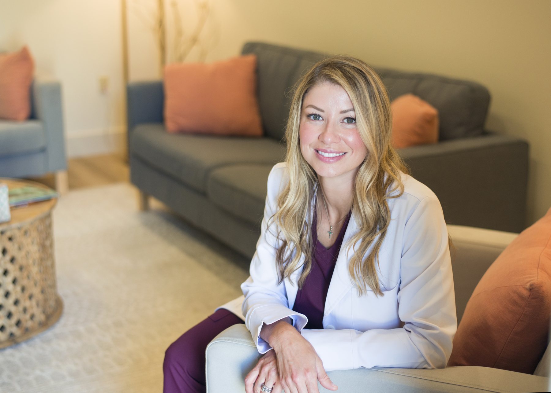 Samantha Cormier, CRNA, FNP-C, in the consultation lounge at Seymour Beauty Aesthetics