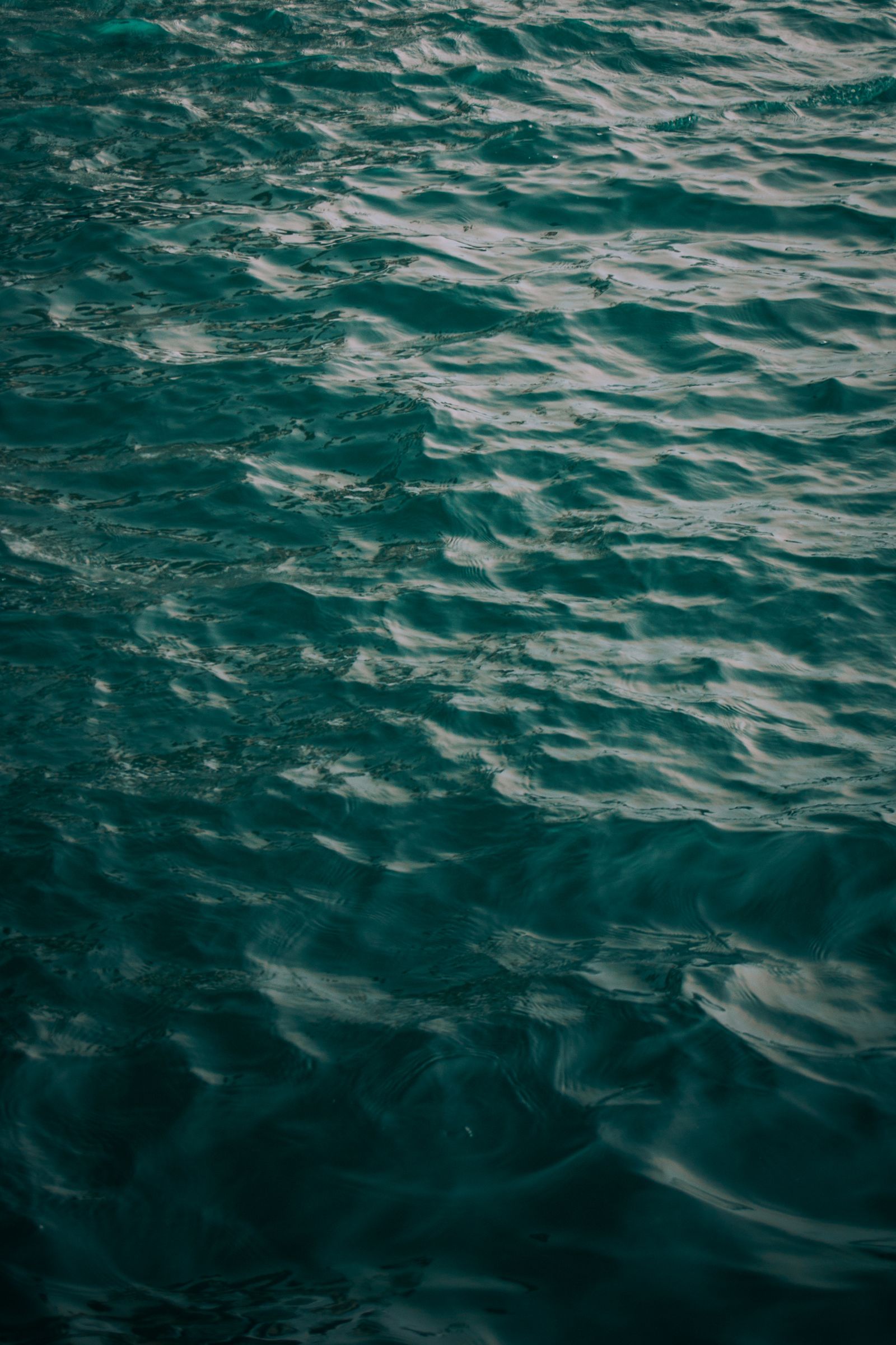 Still teal water